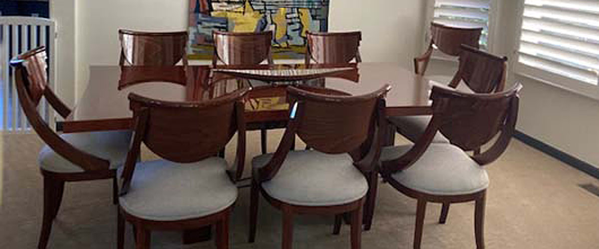 Upholstered dining chairs around a table